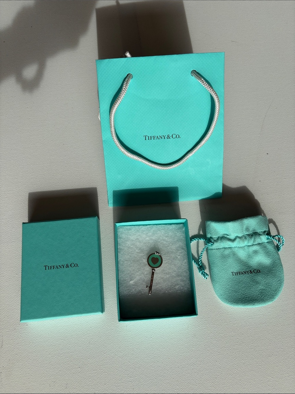Tiffany & Co. Silver Key Pendant with Turquoise Blue Enamel